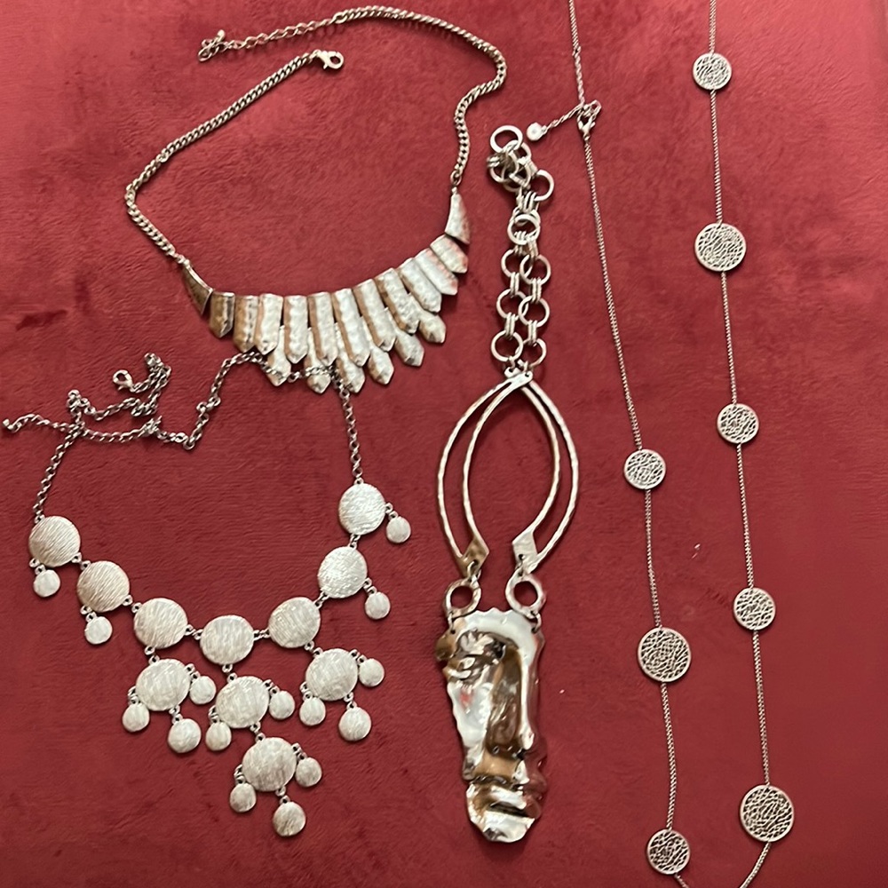 Lot of 4 necklaces. Yes that is a face!